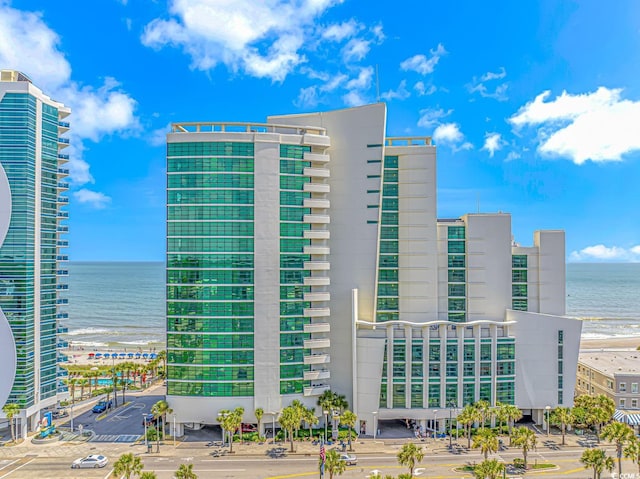 view of building exterior featuring a water view