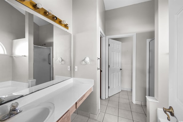 bathroom with tile patterned flooring, vanity, and separate shower and tub