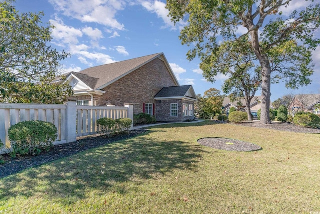 view of property exterior featuring a yard