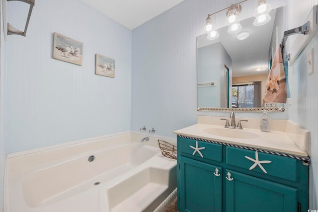 bathroom featuring vanity and a bathtub