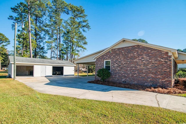 view of property exterior featuring a carport, an outbuilding, and a yard