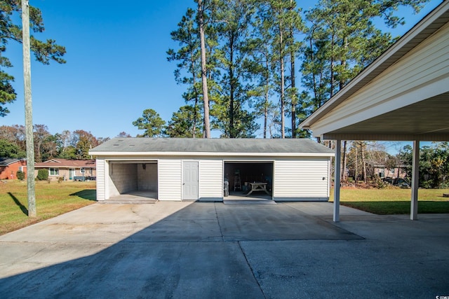 garage with a yard