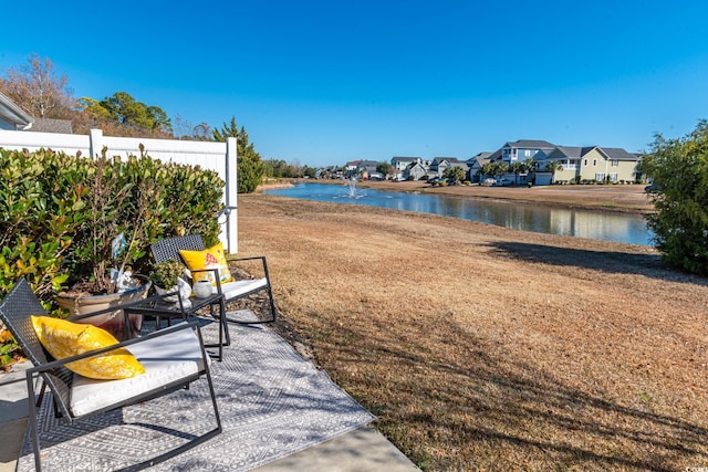 exterior space with a water view