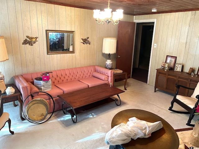 carpeted living room with wooden walls, wooden ceiling, and an inviting chandelier