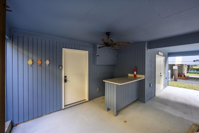 view of patio featuring ceiling fan