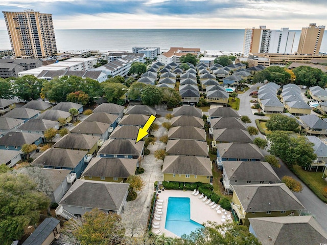 bird's eye view with a water view