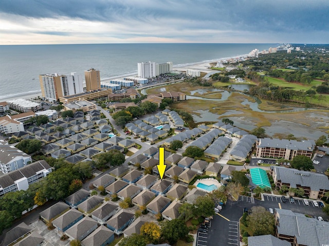 bird's eye view with a water view