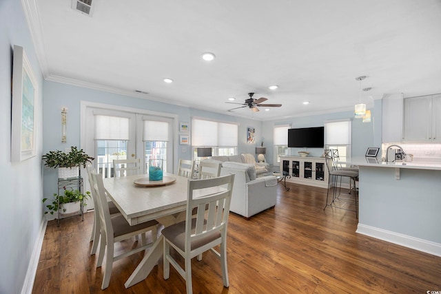 209 N Hillside Dr Unit 201, North Myrtle Beach, SC 29582 - dining space featuring crown molding, a ceiling fan, recessed lighting, dark wood-type flooring, and french doors