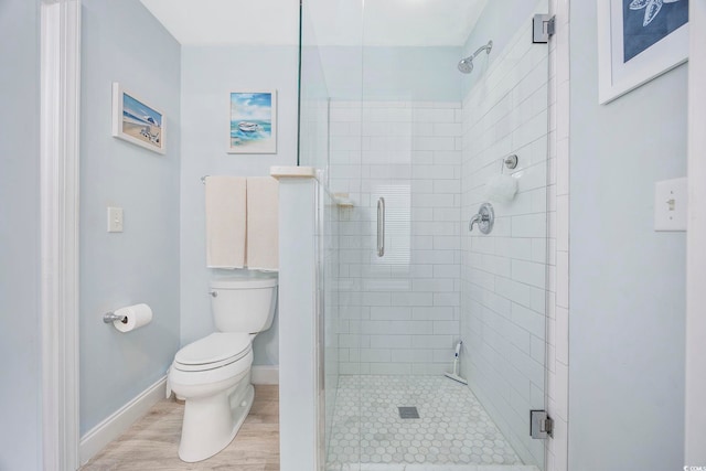 209 N Hillside Dr Unit 201, North Myrtle Beach, SC 29582 - bathroom featuring toilet and a stall shower