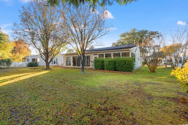 exterior space featuring a front yard