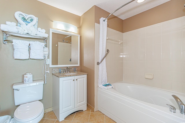 full bathroom featuring tile patterned floors, a textured ceiling, toilet, vanity, and shower / tub combo