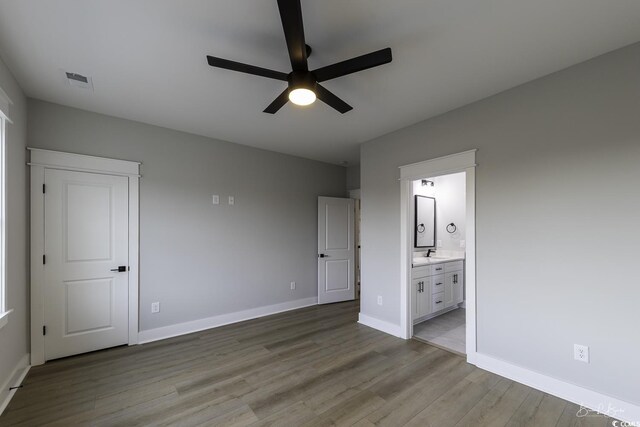 bathroom featuring toilet and walk in shower