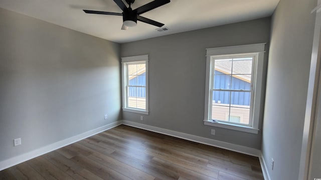 empty room featuring ceiling fan and wood-type flooring