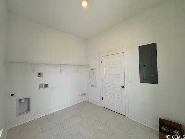 washroom with electric panel, washer hookup, baseboards, electric dryer hookup, and hookup for a gas dryer