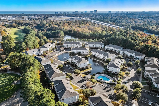 drone / aerial view with a water view