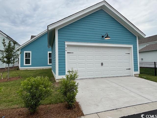 734 Macon Aly, Myrtle Beach, SC 29588 - doorway to property with covered porch and a shingled roof