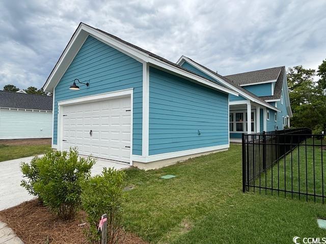734 Macon Aly, Myrtle Beach, SC 29588 - view of side of home with driveway