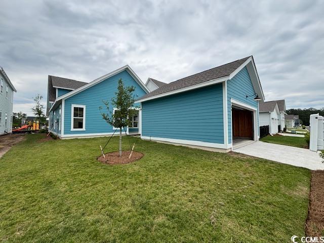 734 Macon Aly, Myrtle Beach, SC 29588 - back of property with a patio area