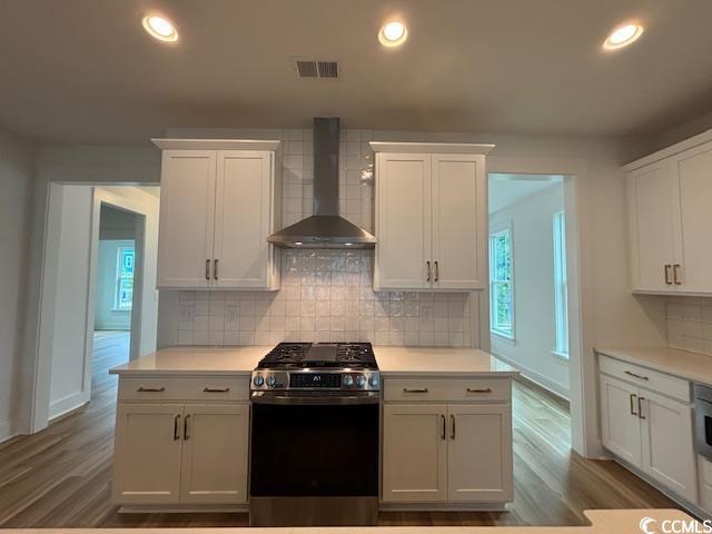 734 Macon Aly, Myrtle Beach, SC 29588 - kitchen featuring wall oven, baseboards, dark wood-style flooring, white cabinetry, and recessed lighting