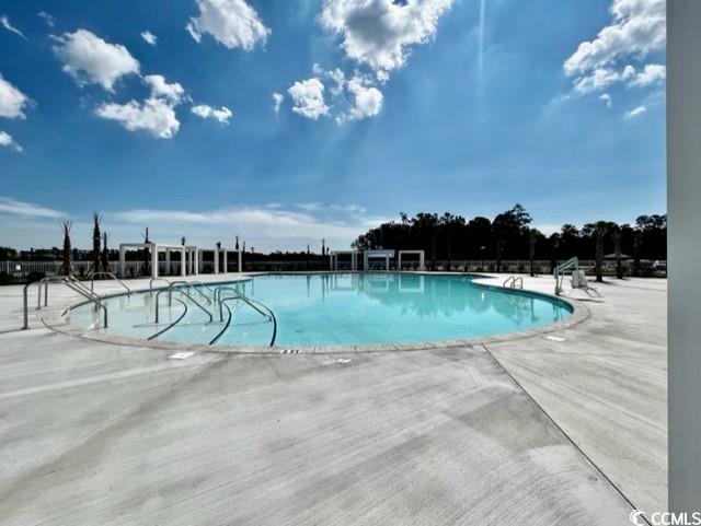 734 Macon Aly, Myrtle Beach, SC 29588 - community pool with a patio area