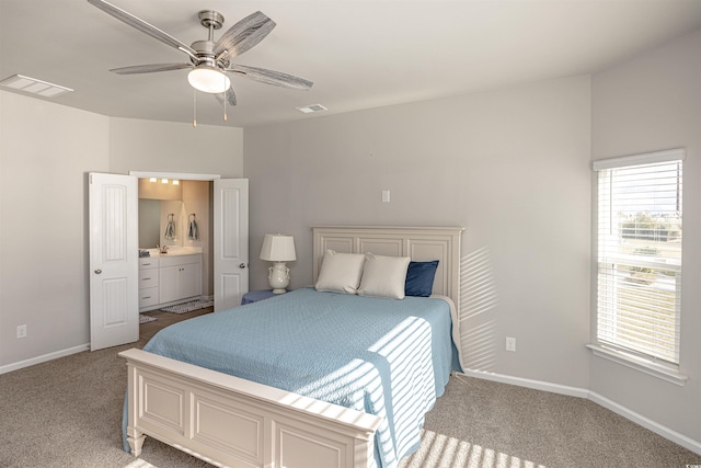 208 Angel Wing Dr, Myrtle Beach, SC 29588 - carpeted bedroom featuring ensuite bath and a ceiling fan
