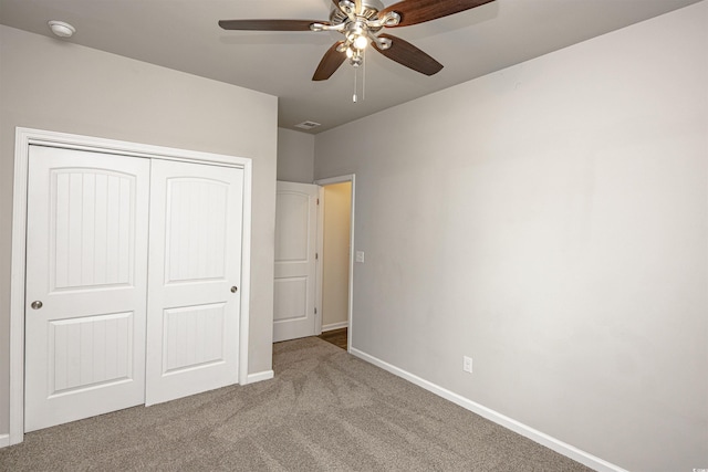 208 Angel Wing Dr, Myrtle Beach, SC 29588 - unfurnished bedroom with carpet floors, a closet, and a ceiling fan