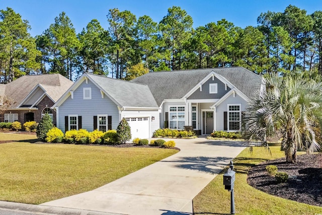 5012 Lindrick Ct, Myrtle Beach, SC 29579 - view of front facade featuring driveway, a front yard, and a garage