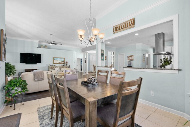 5012 Lindrick Ct, Myrtle Beach, SC 29579 - dining space featuring ceiling fan with notable chandelier, crown molding, baseboards, and light tile patterned floors