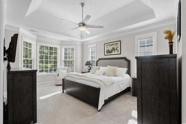 5012 Lindrick Ct, Myrtle Beach, SC 29579 - bedroom featuring light carpet, a tray ceiling, ornamental molding, and multiple windows
