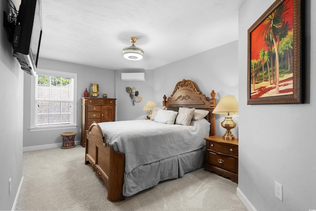 5012 Lindrick Ct, Myrtle Beach, SC 29579 - bedroom with baseboards, a wall unit AC, and light colored carpet