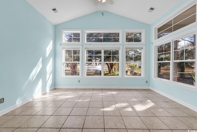 unfurnished sunroom featuring a wealth of natural light, ceiling fan, and vaulted ceiling