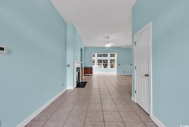 corridor featuring light tile patterned flooring