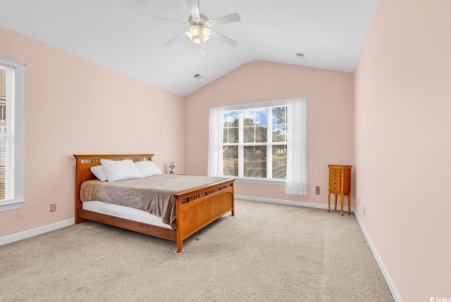 carpeted bedroom featuring ceiling fan and lofted ceiling