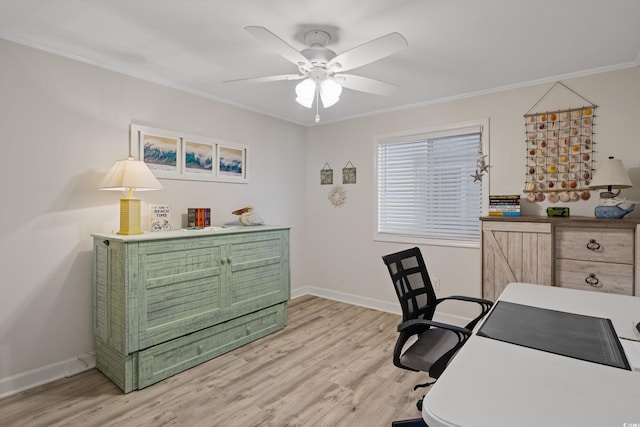 office space featuring ceiling fan, light hardwood / wood-style floors, and crown molding