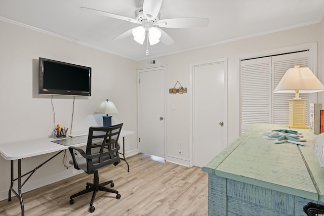 office space with light hardwood / wood-style flooring, ceiling fan, and crown molding