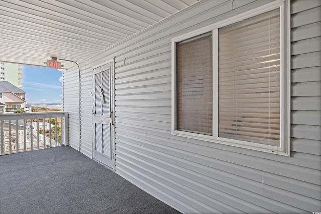 view of patio with a balcony