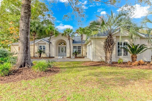 view of front facade with a front yard