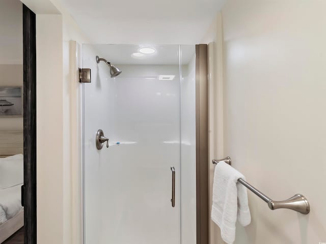 bathroom featuring walk in shower