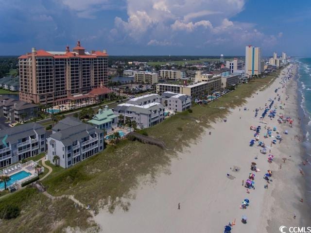 bird's eye view with a view of the beach and a water view