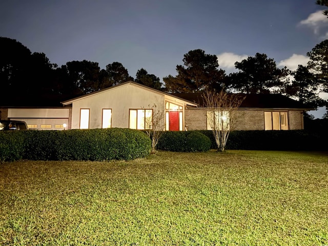 exterior space featuring a front lawn