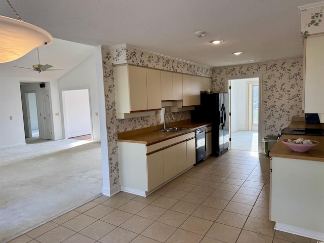 kitchen with light carpet, dishwashing machine, ceiling fan, sink, and cream cabinets