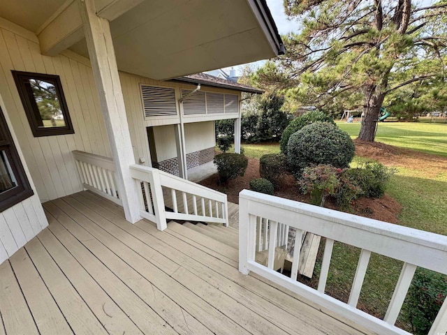 deck featuring a yard