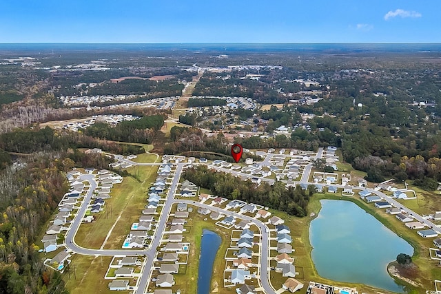 drone / aerial view featuring a water view