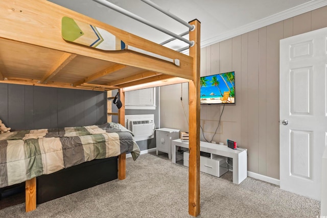 bedroom with carpet floors, cooling unit, ornamental molding, and wood walls