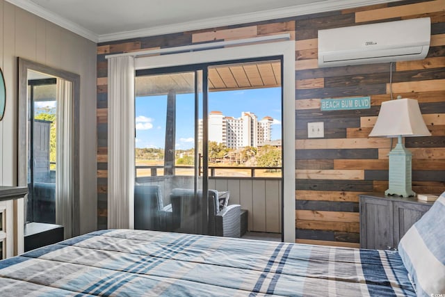 bedroom featuring wood walls, access to exterior, crown molding, and a wall mounted AC