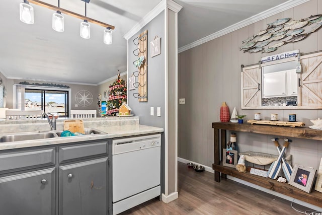 kitchen featuring white dishwasher, dark wood-type flooring, crown molding, sink, and gray cabinets