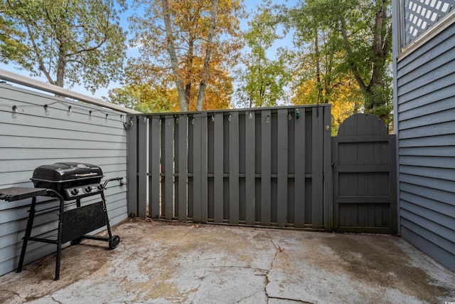 view of patio featuring a grill