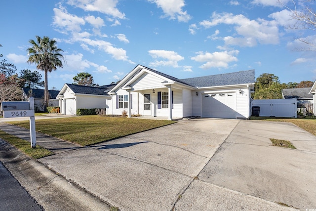 ranch-style house with a front lawn and a garage