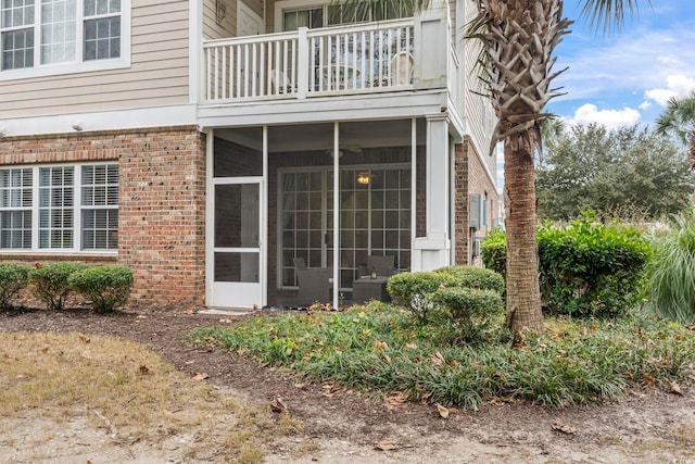 entrance to property with a balcony