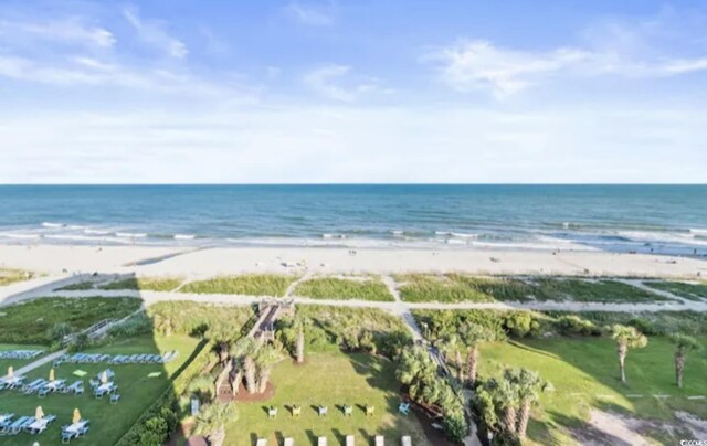 bird's eye view featuring a beach view and a water view